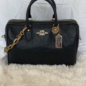 COACH Black Embossed Leather Satchel with Gold Hardware and coach charms